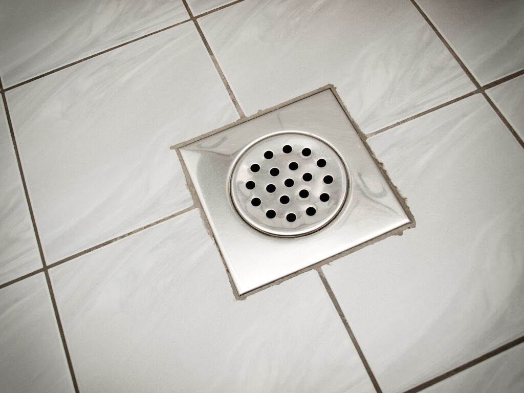 Basement Floor Drain Geysers After Cloudbursts: Backflow Diagnostics That Stick